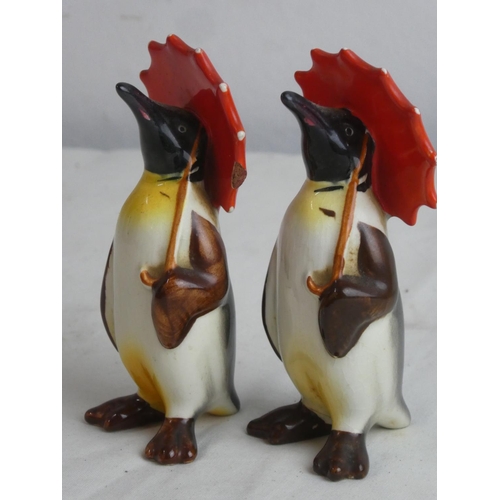 63 - A vintage Carlton Ware honey pot and a pair of Beswick penguins (a/f).