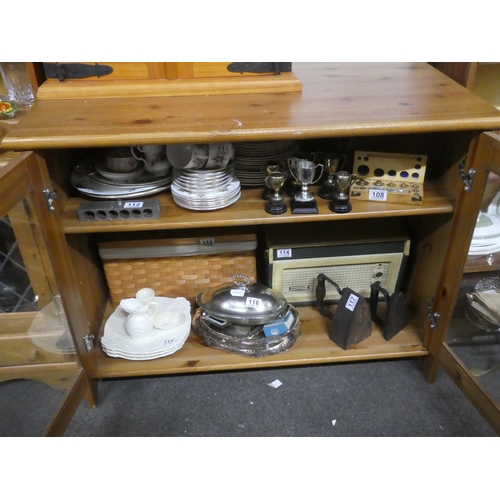 107 - A large two door pine cabinet with glazed doors, measuring 63cm x 95cm x 75cm.