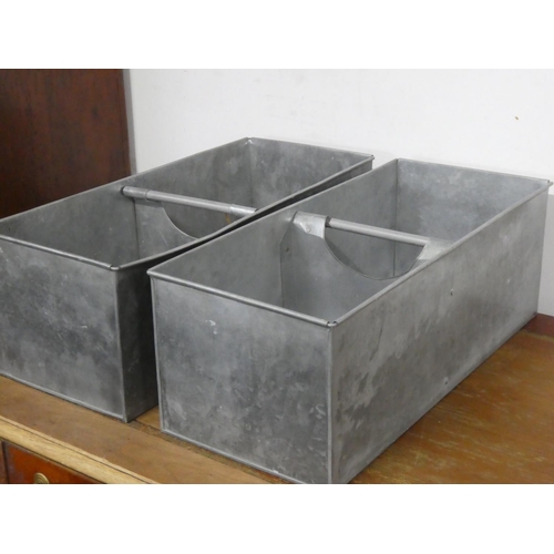 143 - A pair of modern metal trugs/ tool caddys.