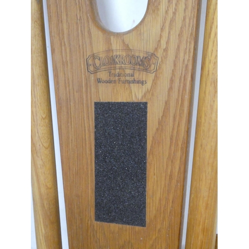 151 - A Cloakrooms folding boot jack, measuring 36