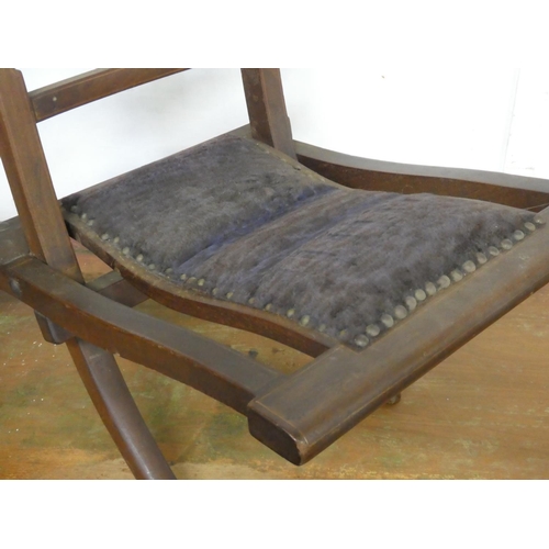 152 - An antique folding chair.