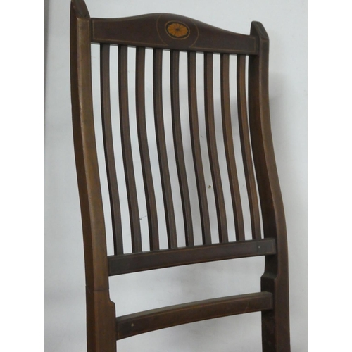 152 - An antique folding chair.