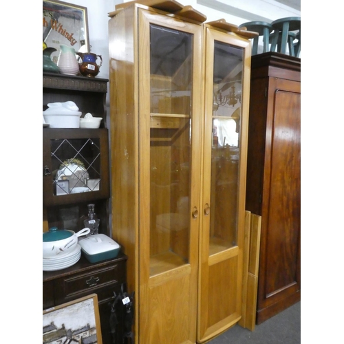 155 - A pair of vintage Ercol Windsor display cabinets with adjustable modular shelving.