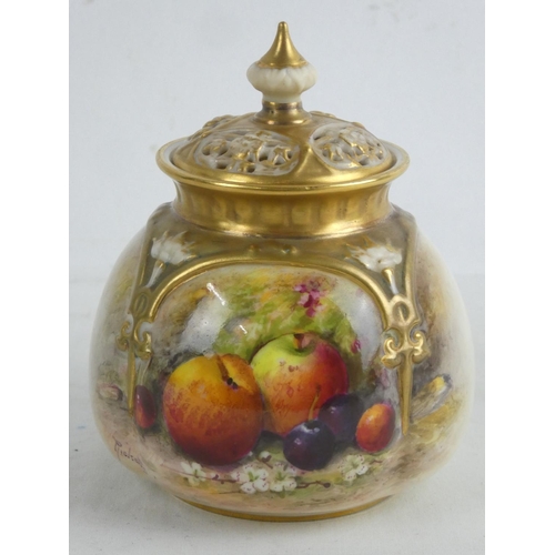 A stunning hand painted Royal Worcester lidded pot pourri signed Ricketts, measuring 4.5" tall.