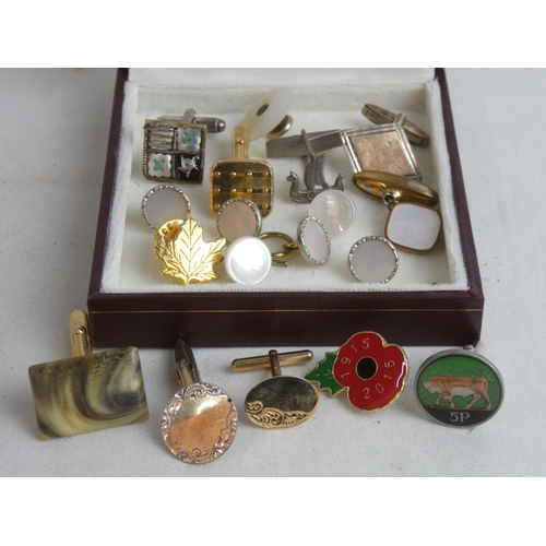 180 - A lot of assorted cufflinks, pins etc.