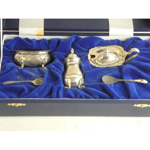 185 - A cased Sterling silver cruet set.