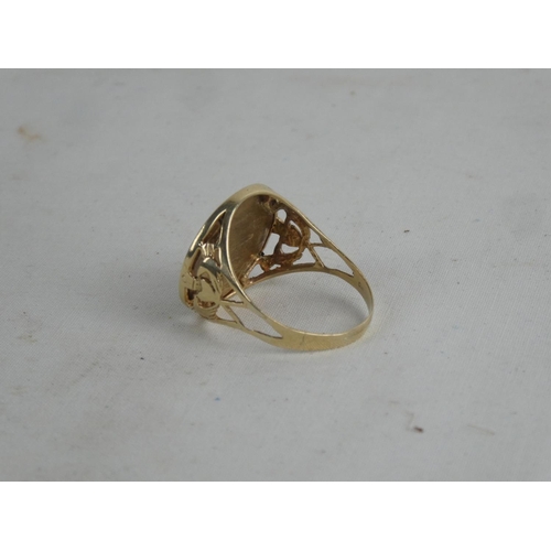 188 - A 9ct gold Claddagh & dartboard style Gents ring, size W, weight 9g.