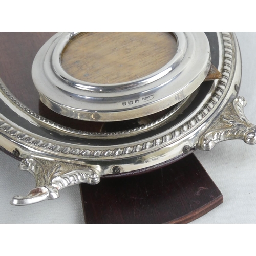 193 - Two Sterling silver photograph frames, measuring including frame 7.5cm and 18cm.