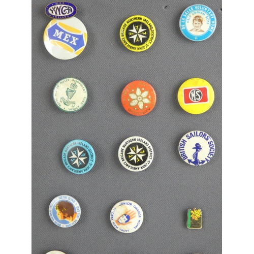 199 - A display of vintage collectors badges including British Sailors Society, Royal Ulster Benevolent Fu... 