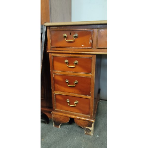 136 - An antique style office desk.