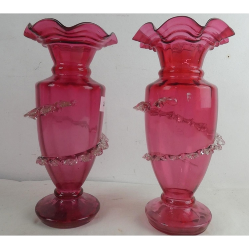 203 - A pair of antique ruby vases (a/f).