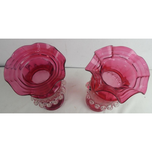 203 - A pair of antique ruby vases (a/f).