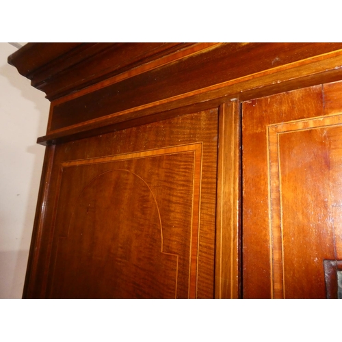 213 - An antique mahogany and inlay wardrobe with mirror panel door. 50x78.5x19 inch