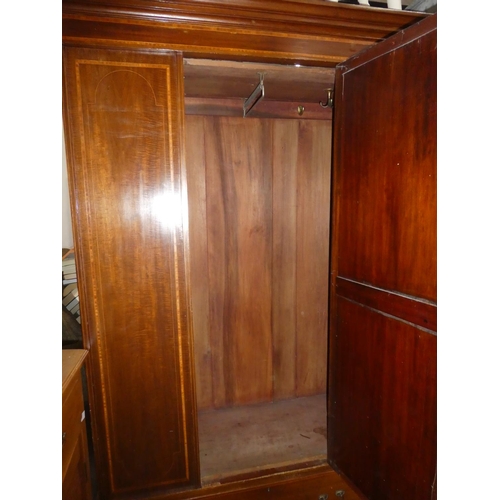 213 - An antique mahogany and inlay wardrobe with mirror panel door. 50x78.5x19 inch