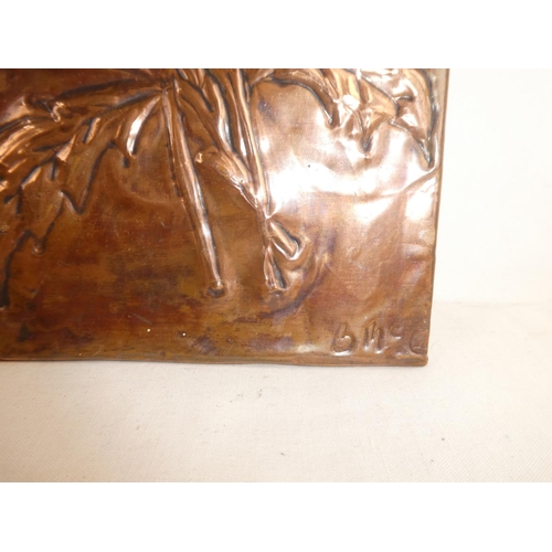 221 - Two vintage copper wall plaques of flowers and a horses head signed B McC, measuring 13cm x 28cm.