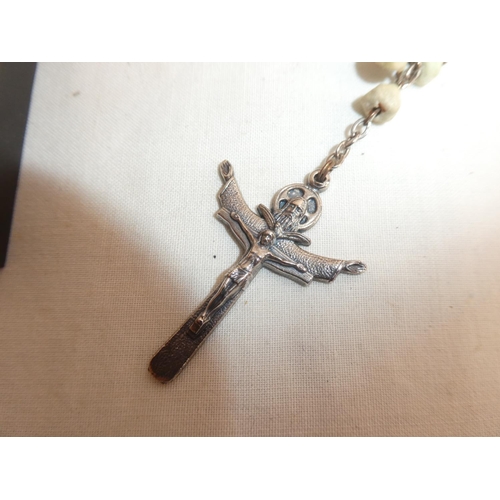 228 - 2 sets of Rosary Beads & a brass crucifix.