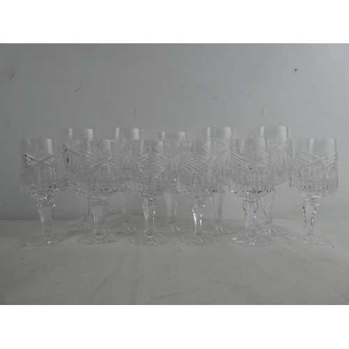 230 - A set of five and six crystal glasses.