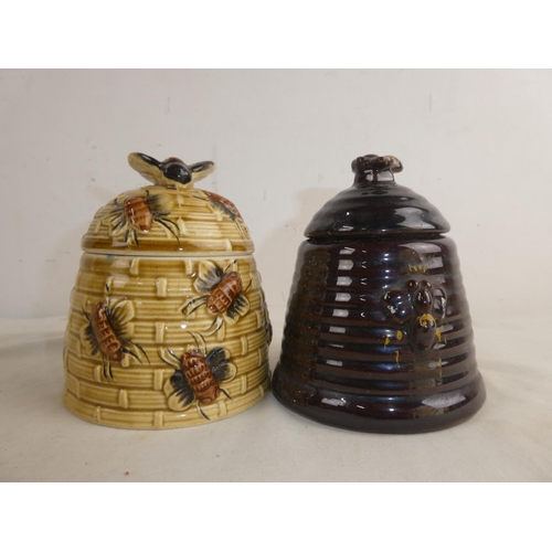 231 - Two vintage ceramic honey pots.