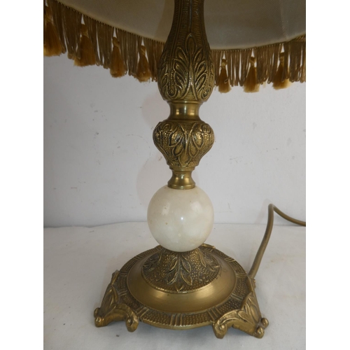 236 - A vintage gilt and marble based table lamp.