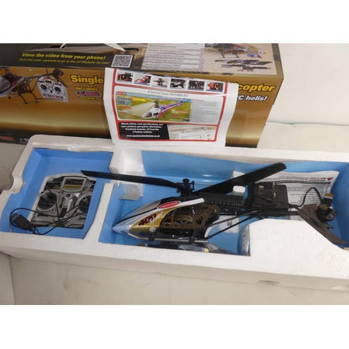 258 - Two boxed remote controlled helicopters.