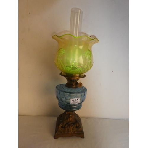 280 - A stunning antique blue glass font cottage oil lamp with Uranium glass shade.