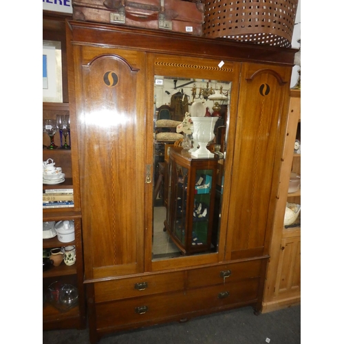 284 - A stunning antique mahogany mirror door wardrobe with Art Deco inlay design. 82x55x21 inch