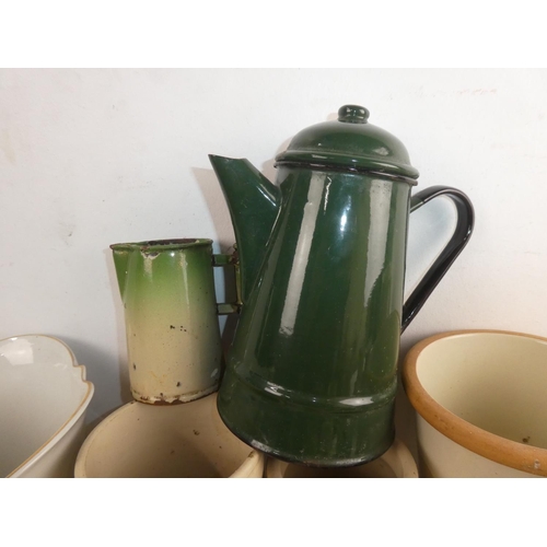 299 - A large lot of antique stoneware jars, bottles etc, a vintage green enamel coffee pot and jug and lo... 