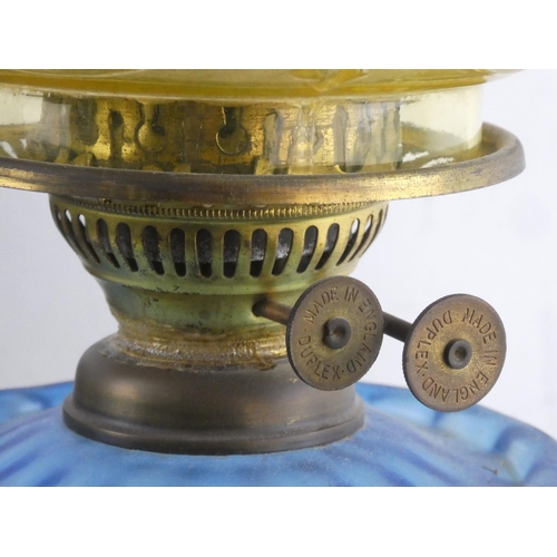 280 - A stunning antique blue glass font cottage oil lamp with Uranium glass shade.