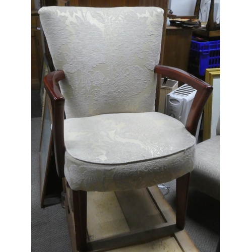 285 - An upholstered armchair.