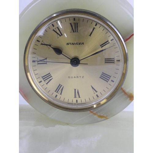 291 - A vintage brass cased Seiko alarm clock & more.