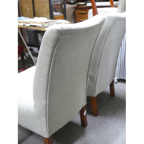 292 - A pair of upholstered chairs.