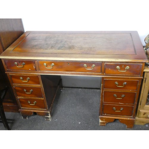 136 - An antique style office desk.