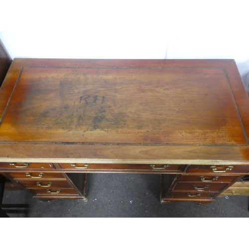 136 - An antique style office desk.