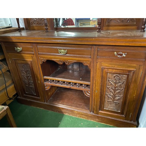 205 - An antique mahogany sideboard with mirror back.