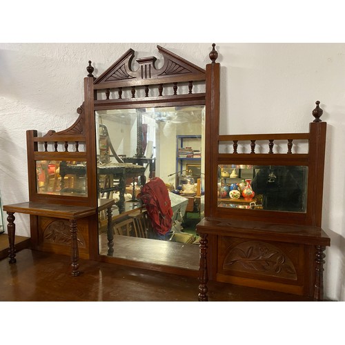 205 - An antique mahogany sideboard with mirror back.