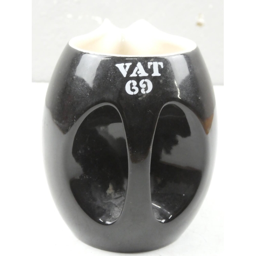 65 - A vintage Wade Regency VAT 69 pub jug.