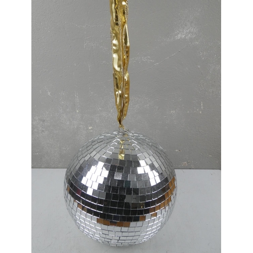 72 - A large glitter ball.