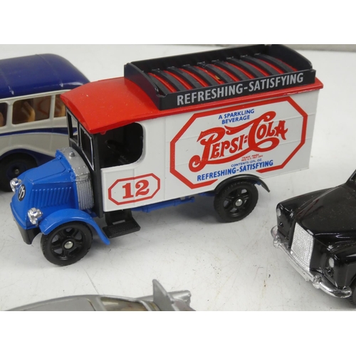 78 - A collection of model cars including Corgi 007 Aston Martin, a Corgi Persil wagon, a Corgi W Alexand... 