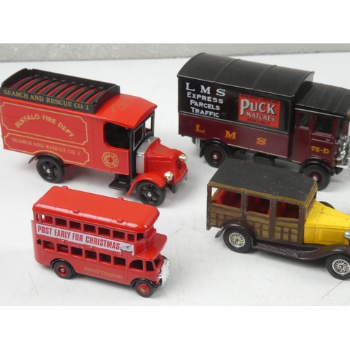 82 - A Corgi diecast Buffalo Fire Dept model lorry, a Corgi LMs Express Parcels Traffic model truck, a Co... 