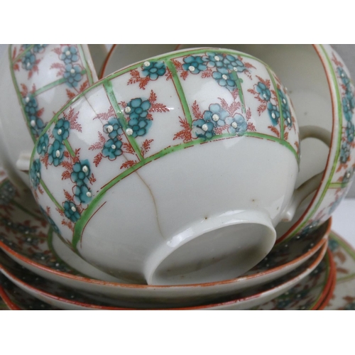 98 - A large antique teaset with floral design.