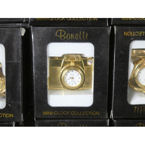 107 - A large lot of 29 boxed Bonetti mini-clock collection clock sets.