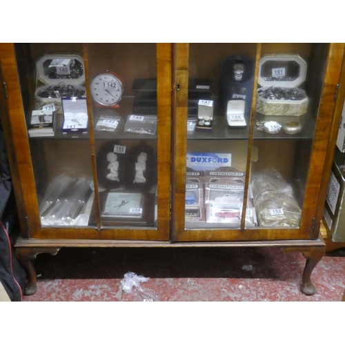 130 - A vintage china display cabinet with two glass shelves.