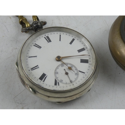 150 - An antique Sterling Silver pocket watch and metal chain and holder.