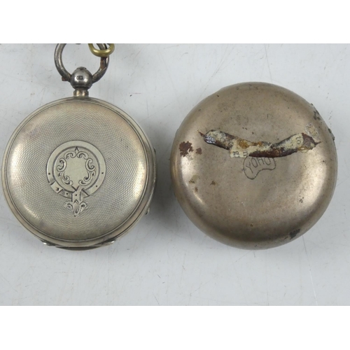 150 - An antique Sterling Silver pocket watch and metal chain and holder.