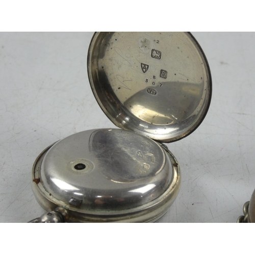 150 - An antique Sterling Silver pocket watch and metal chain and holder.