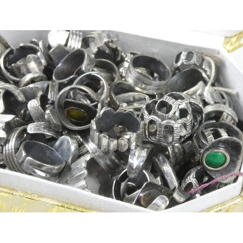 151 - A jewellery box containing a large quantity of vintage white metal dress rings.