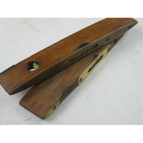 165 - A vintage J Rabone & Sons wood and brass spirit level and another.