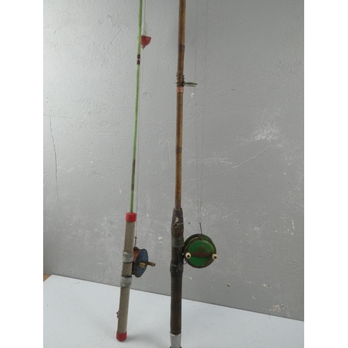 169 - A vintage cane fishing rod and another.