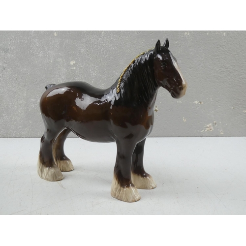 188 - A Royal Doulton shire horse .