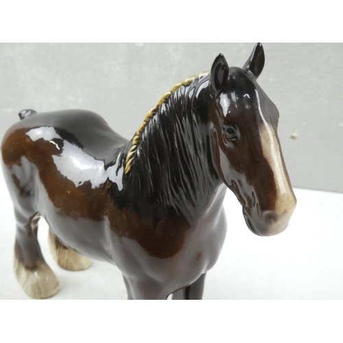 188 - A Royal Doulton shire horse .